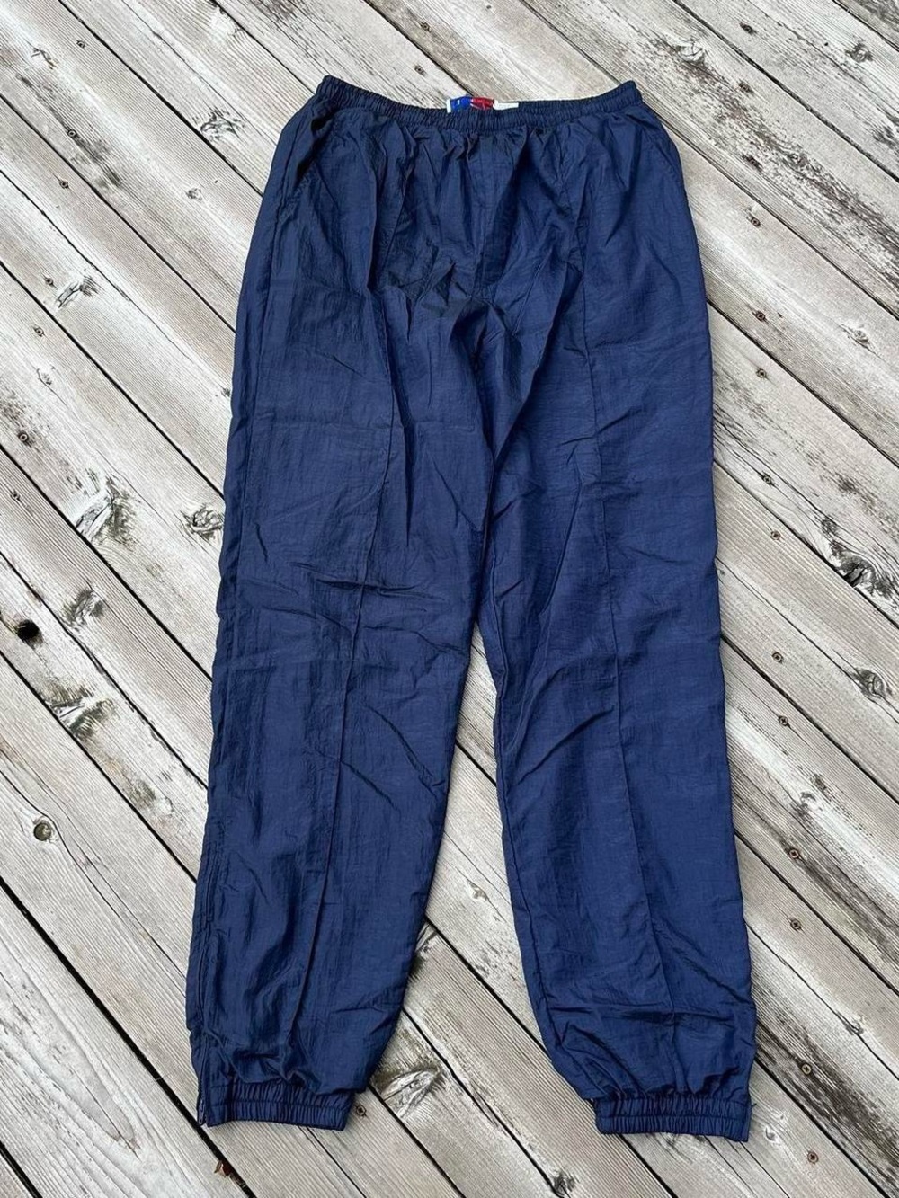 Pro Celebrity navy blue windbreaker track pants